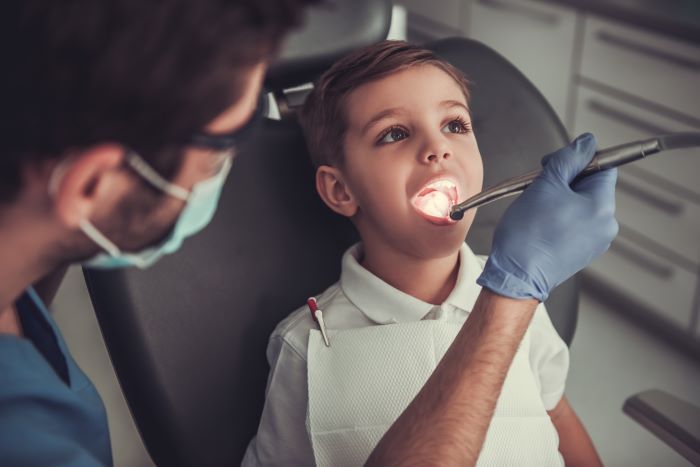 See a Pediatric Dentist
